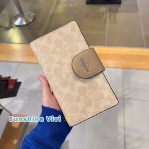 NWT Coach Phone Wallet In Signature Canvas CW780 SV/Sand/Taupe